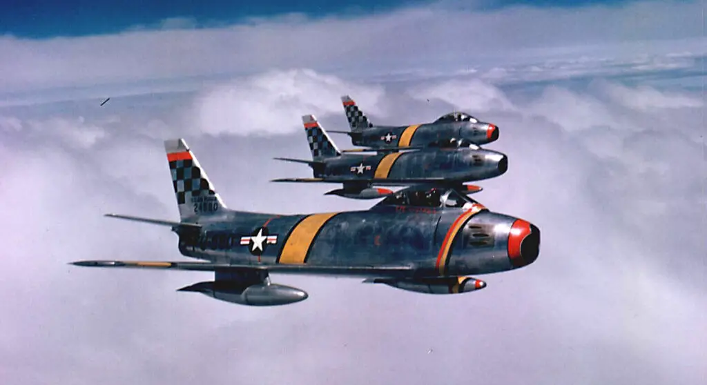 Col. Benjamin O. Davis Jr., commander of the 51st Fighter Interceptor Wing, leads a three-ship F-86F Sabre formation during the Korean War in 1954