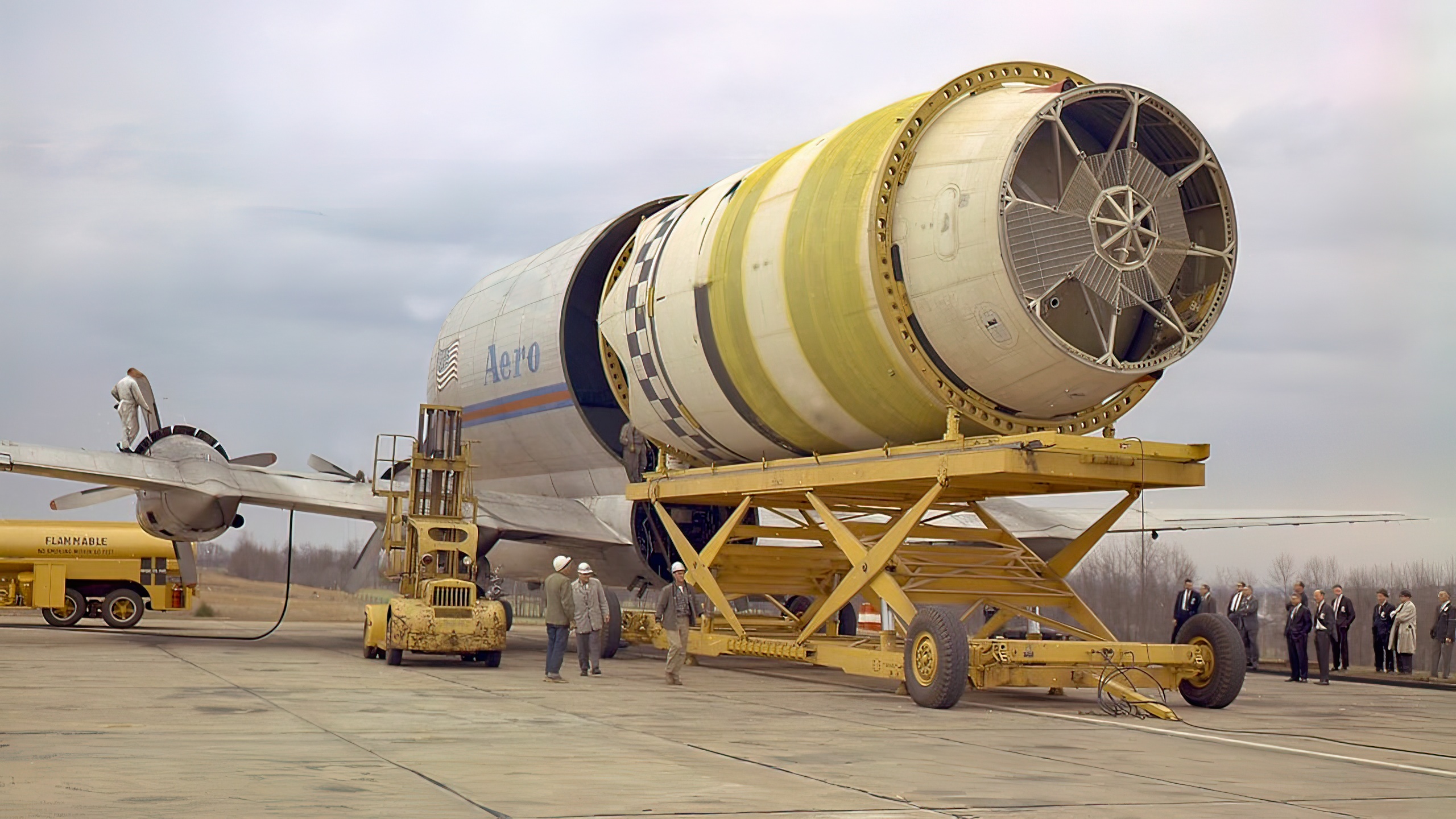Saturn I's S-IV stage loaded onto a modified Boeing B-377 Stratocruiser for transport