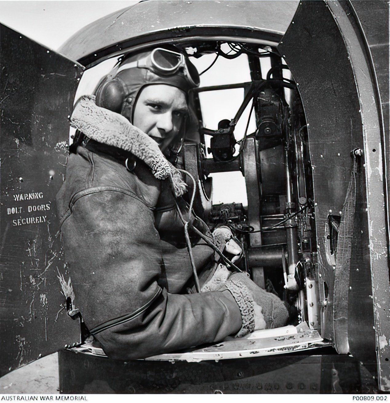 RAF rear gunner Scotty in turret of Wellington bomber aircraft