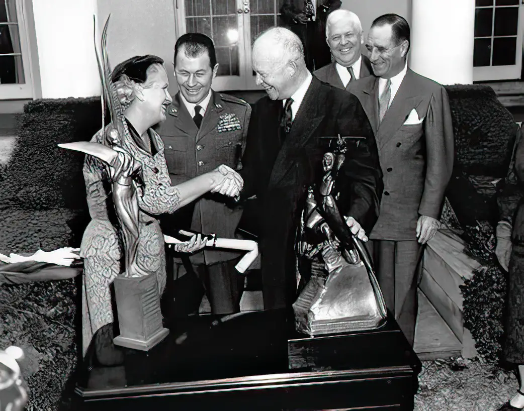 Jackie Cochran and Chuck Yeager President Dwight D. Eisenhower