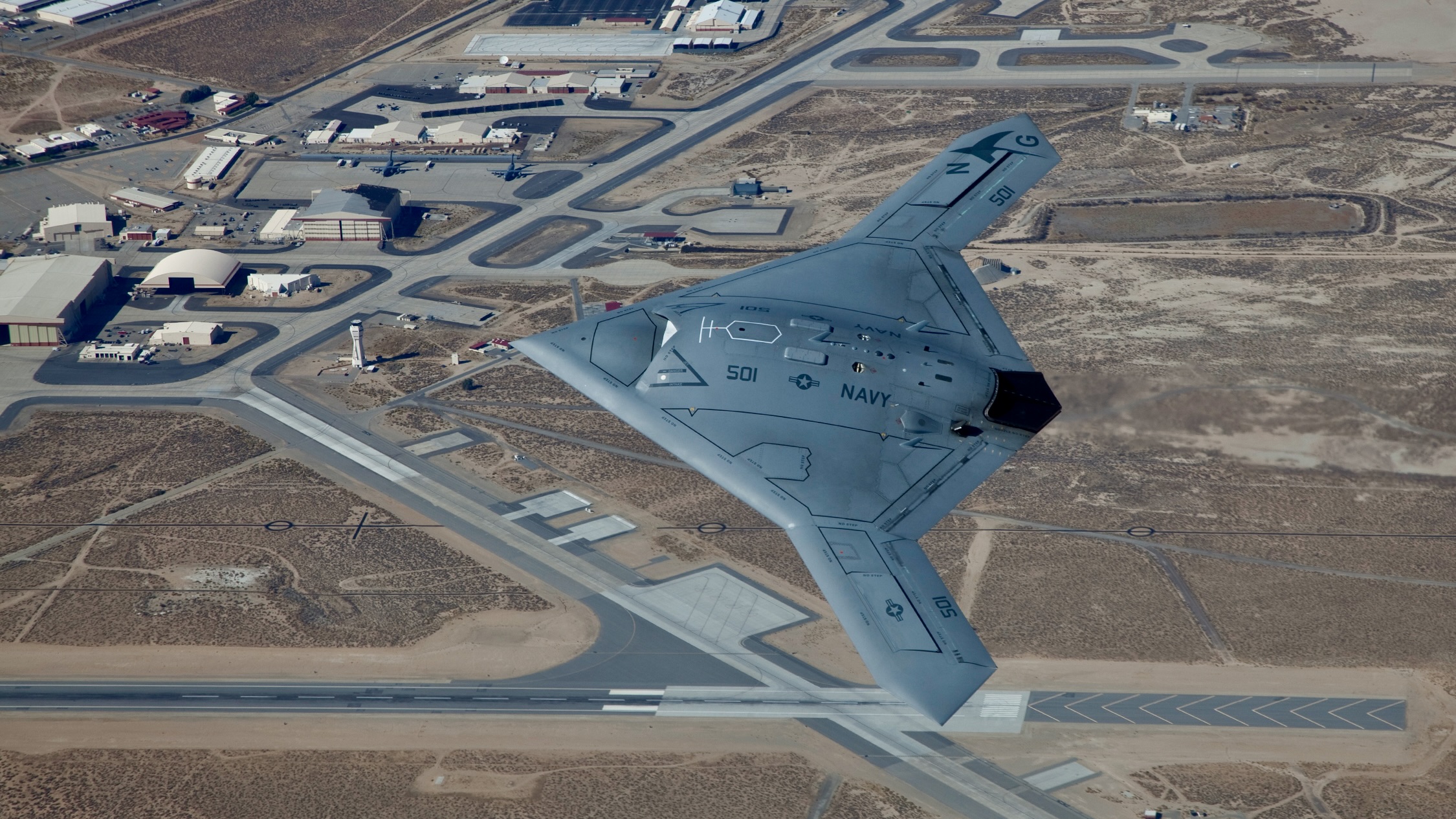 U.S. Navy's X-47B Unmanned Combat Air System demonstrator flies over Edwards during a routine test mission