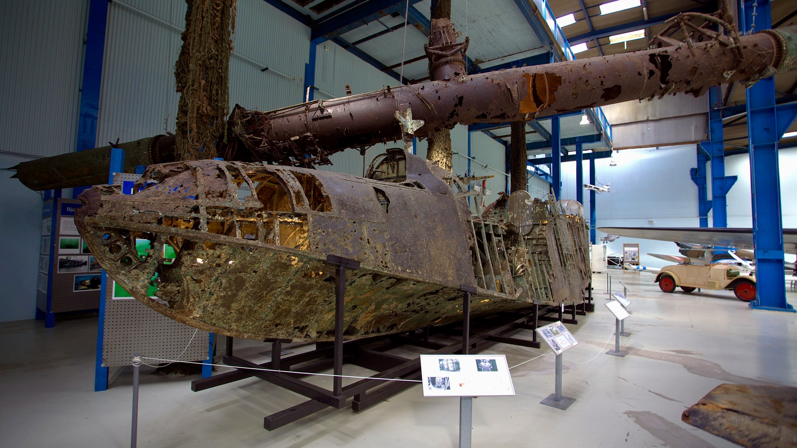 The wreck of a Blohm & Voss BV 138 at display at the National Museum of Science and Technology (Danmarks Tekniske Museum) in Elsinore, Denmark. The wing spar is poised over the aircraft in the same position as it was, when the wreck was discovered in The Sound, off of Copenhagen