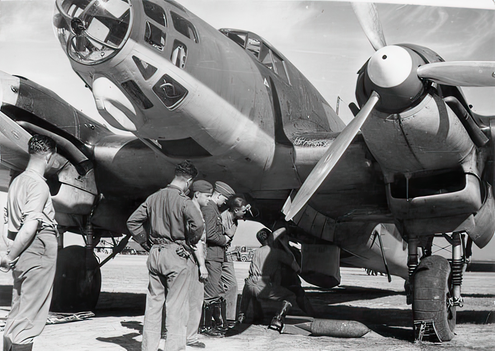 Spain.- Loading a Heinkel He 111 E with bombs