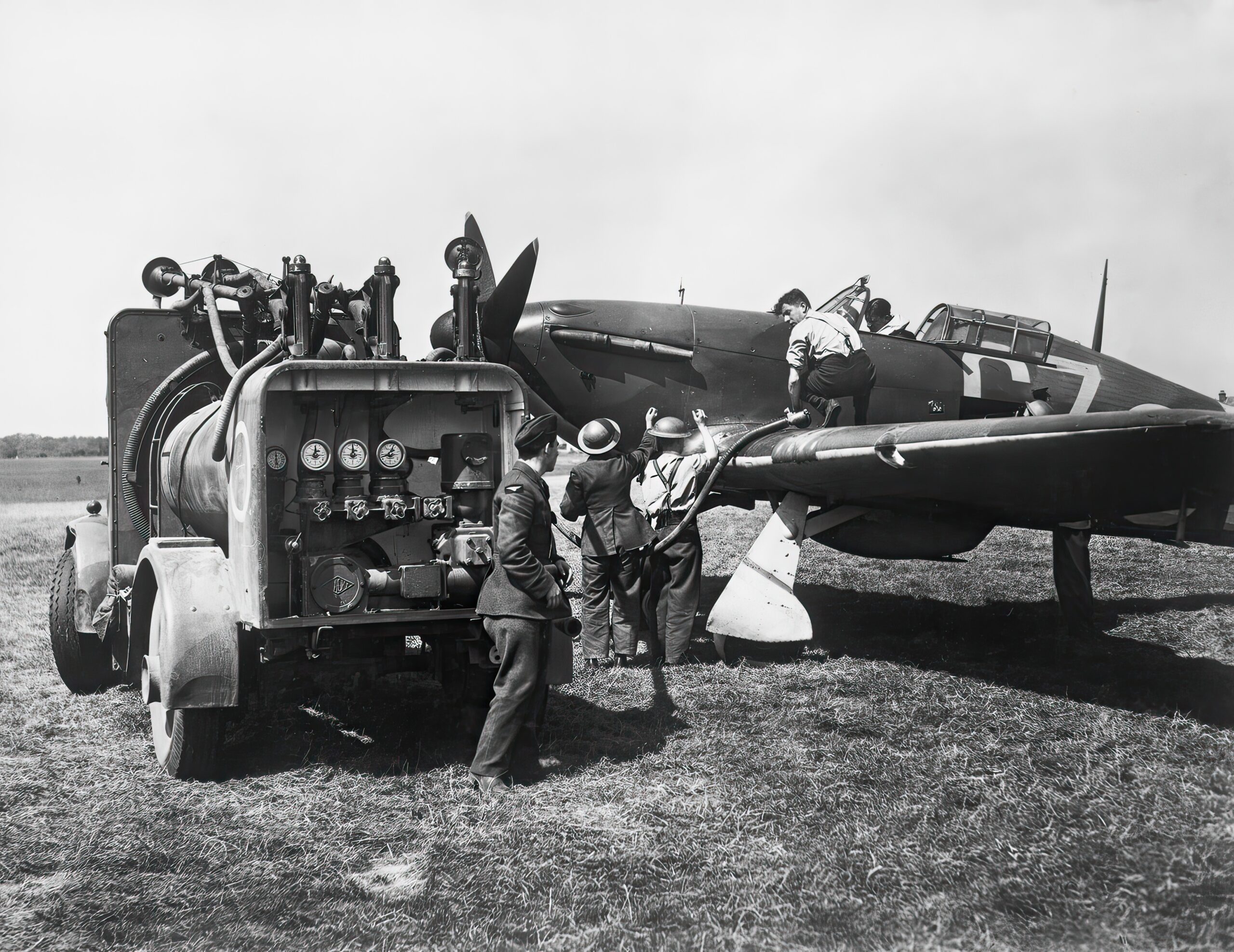Groundcrew refuelling a Hurricane Mk.I of 32 Squadron