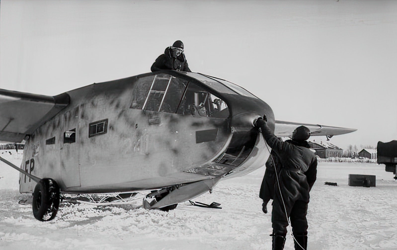 Latching the tow rope into the bow connector, Cholm January 1942