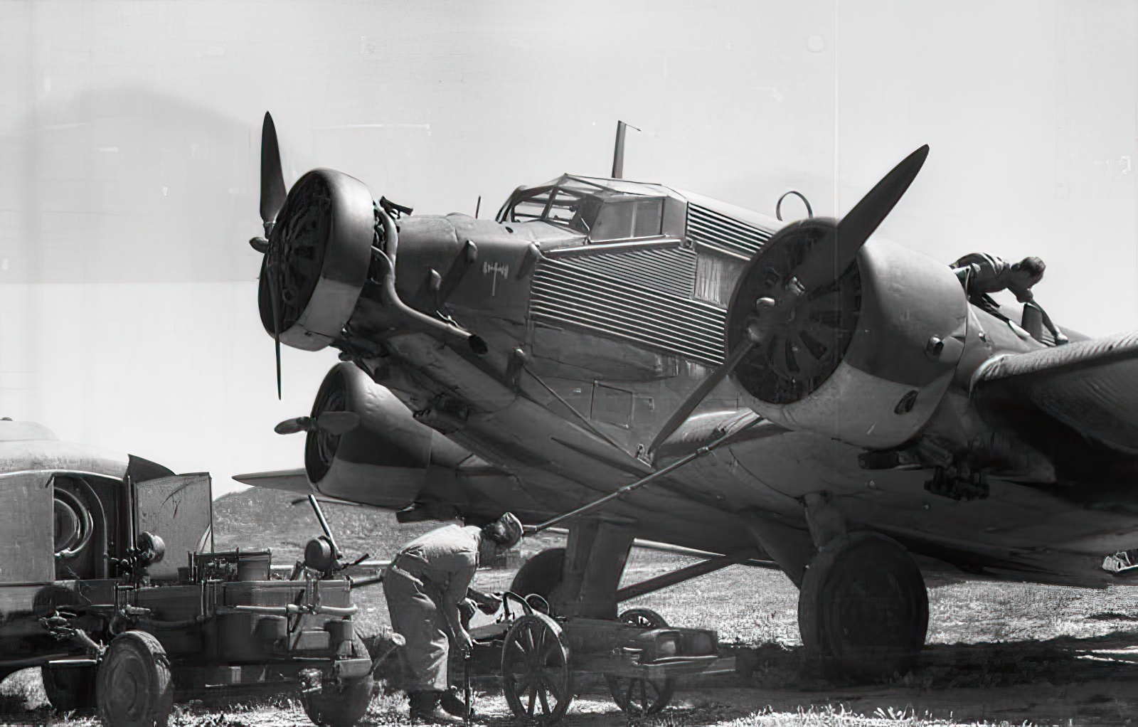 A Luftwaffe Ju 52 being serviced in Crete in 1943: Note the narrow-chord Townend ring on the central engine and the deeper-chord NACA cowlings on the wing engines