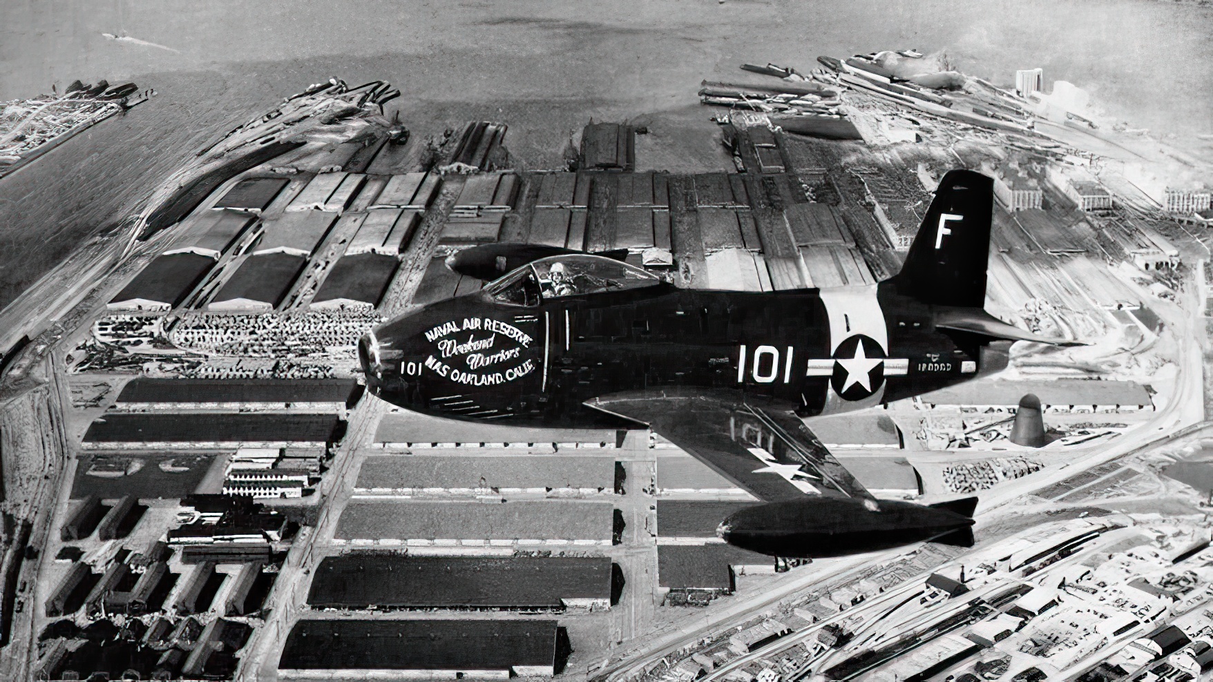 U.S. Navy North American FJ-1 Fury of the Oakland Naval Air Reserve flying over Oakland, California (USA), ca. 1950