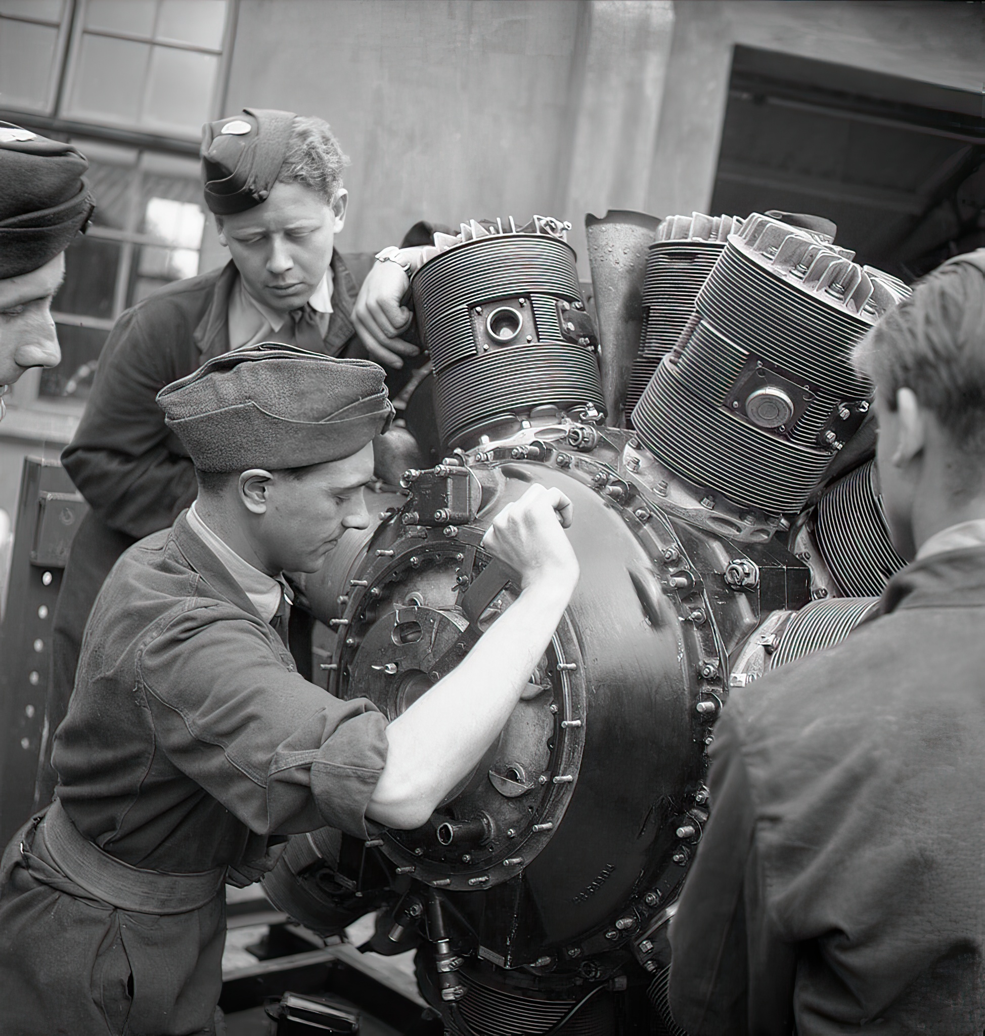 Belgian trainees at work on a Hercules aero-engine at the Belgian Air Training School at Snailwell in Cambridgeshire, 1945