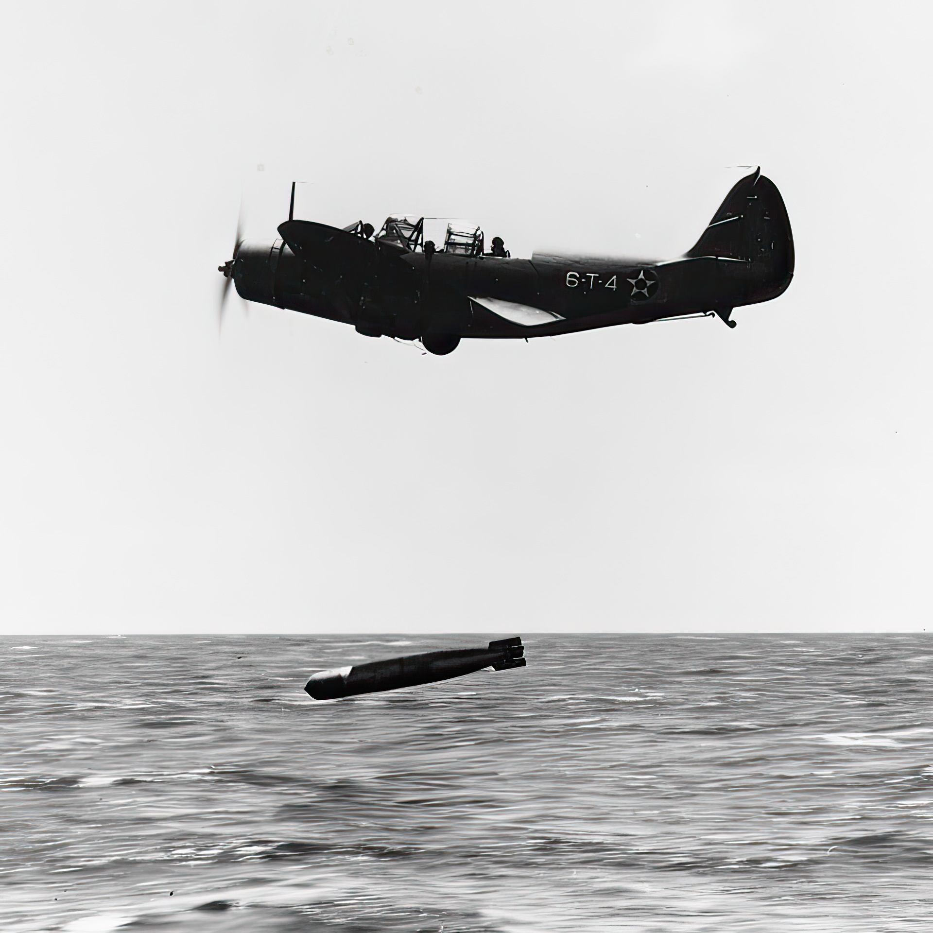 U.S. Navy Douglas TBD-1 Devastator (BuNo 0325, "6-T-4") of Torpedo Squadron 6 (VT-6) from the aircraft carrier USS Enterprise (CV-6) making a practice drop with a Mark 13 torpedo October 20 1941