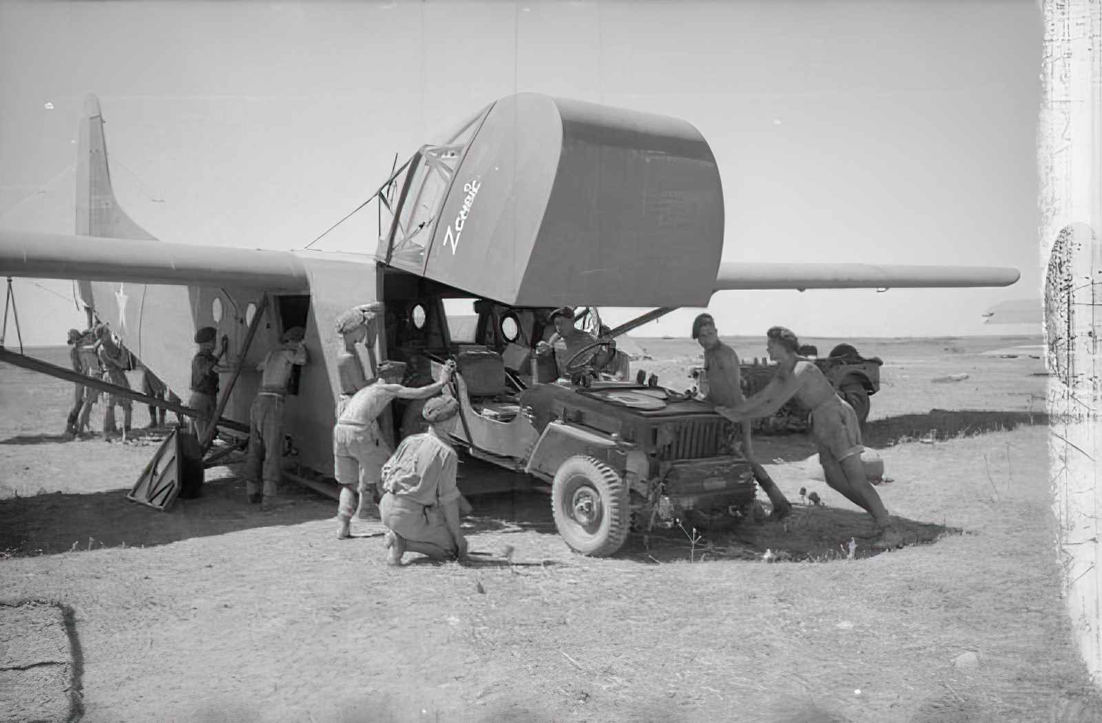 THE CAMPAIGN IN SICILY 1943. Planning and Preparations January - July 1943: A jeep is loaded onto an American WACO CG-4A glider