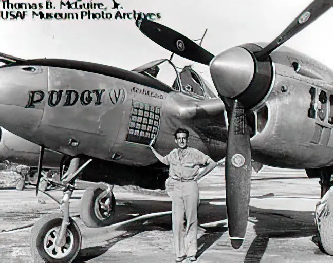 Thomas B. McGuire Jr. with Pudgy (V), his regular P-38L-1-LO, S/N 44-24155, although he was killed in another aircraft (P-38L S/N 44-24845). (U.S. Air Force photo)