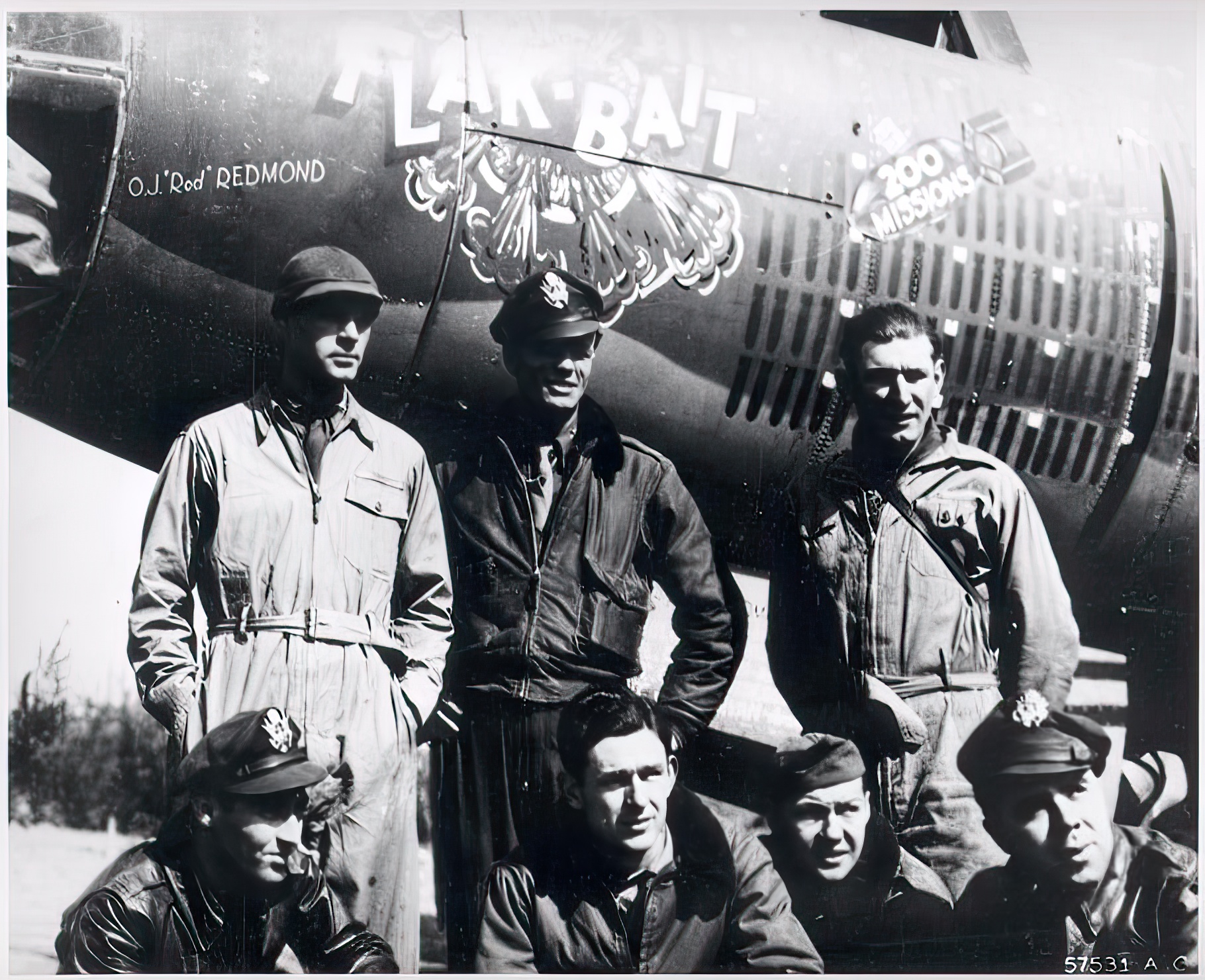 Flak-Bait’s crew poses with the bomber after the April 17, 1945 200th mission. The celebratory 200 Missions “bomb” just under the pilot’s cockpit is not the one found on the artifact today. This one was either superimposed on the aircraft or the photograph