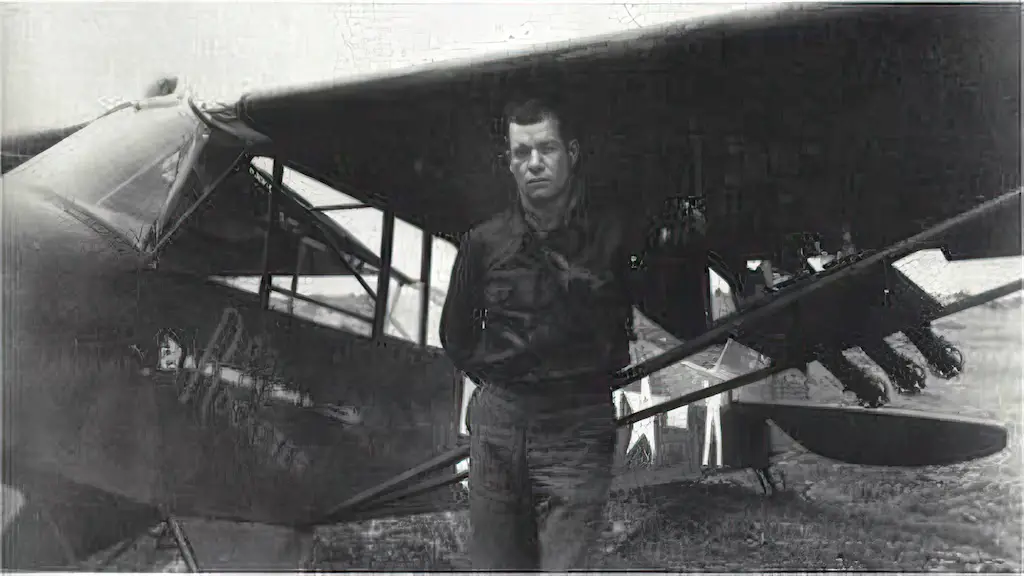 Charles Carpenter and his L-4, "Rosie the Rocketer"
