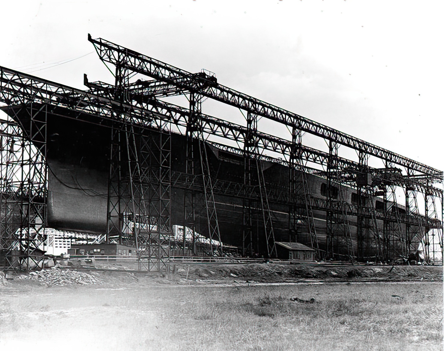 USS Lexington (CV-2) on the building ways at the Fore River Shipyard, Quincy, Massachusetts, shortly before her launching, circa late September or early October 1925