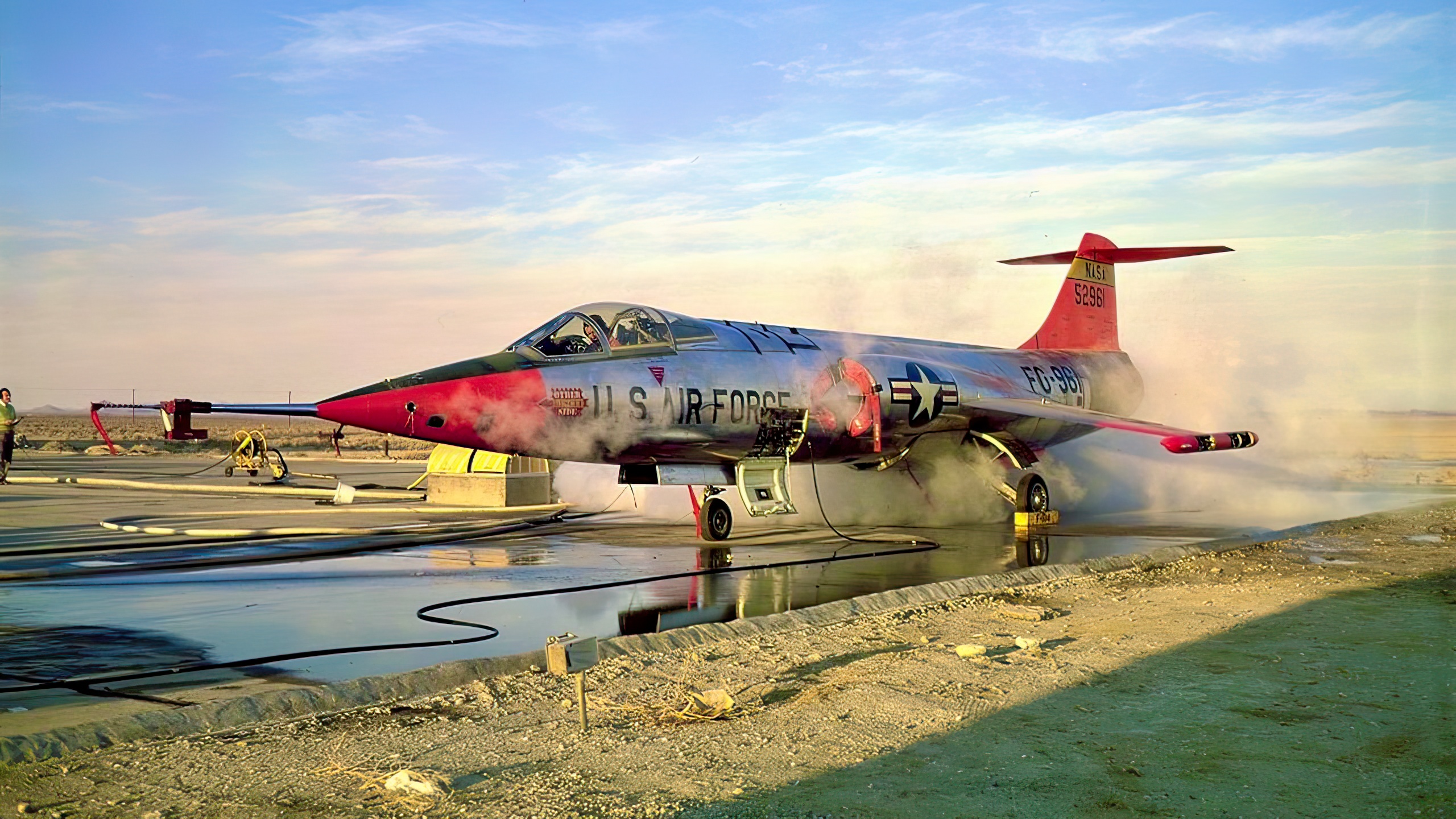 JF-104A (formerly YF-104A, serial #55-2961) ground testing its reaction control system. The aircraft was modified with a hydrogen peroxide reaction control system (RCS). Following a zoom climb to altitudes in the vicinity of 80,000 feet, the RCS gave the jet controllablity in the thin upper atmosphere where conventional control surfaces are ineffective