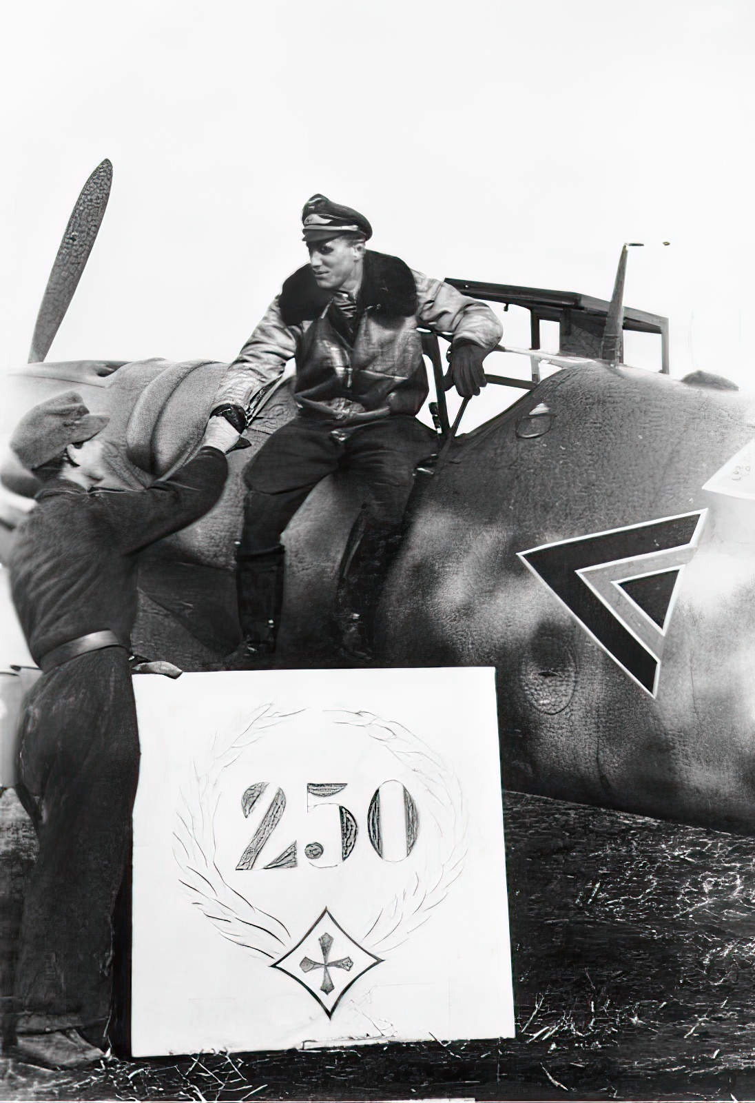 Major Rall, leaves his plane after his 250th aerial victory