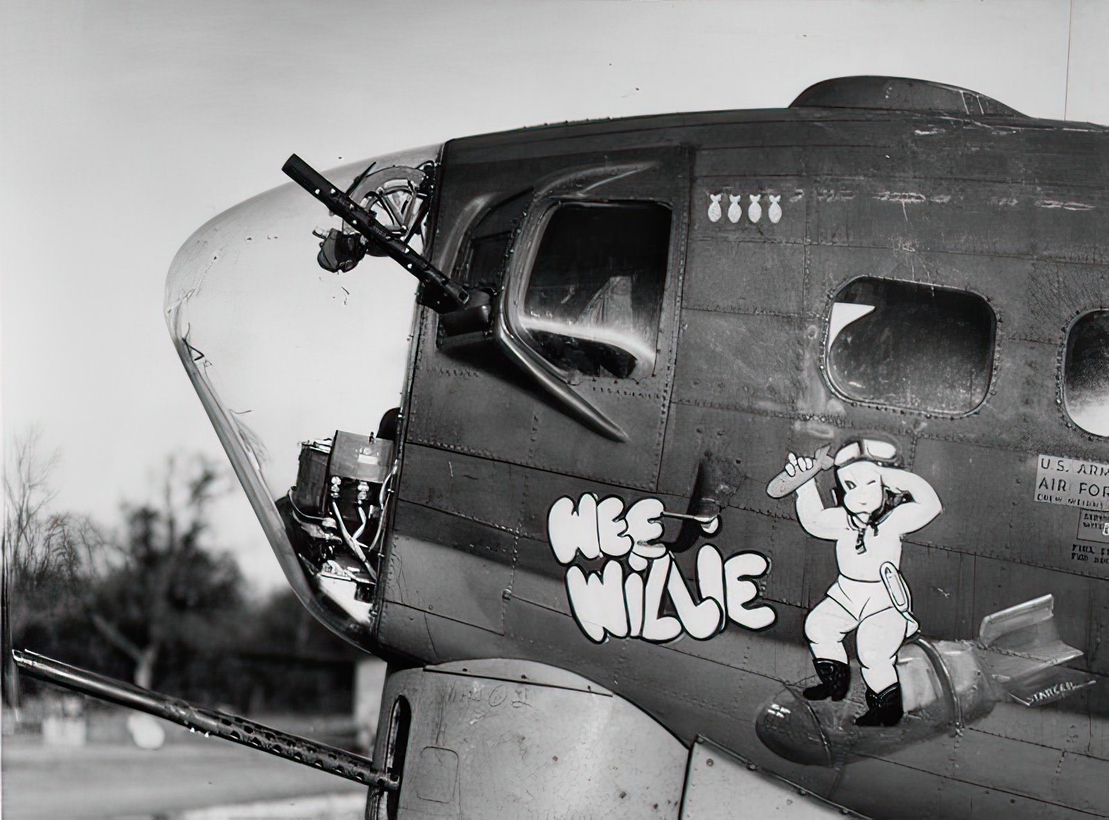 Nose art on the Boeing B-17G Flying Fortress Wee Willie. (Photo Credit: Roger Freeman Collection