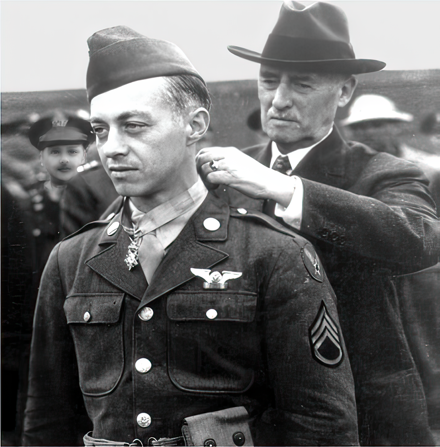 More details More details Sergeant Maynard H. Smith, a en:B-17 Flying Fortress gunner, receiving the first Medal of Honor to be awarded to an enlisted man from en:United States Secretary of War en:Henry L. Stimson