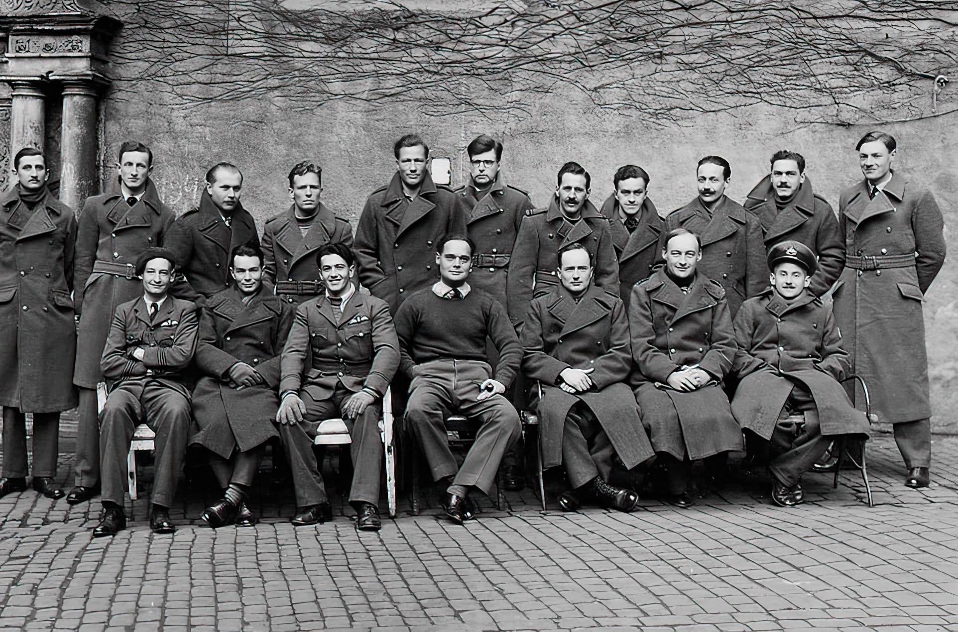 Bader sitting middle, with a mess in Colditz