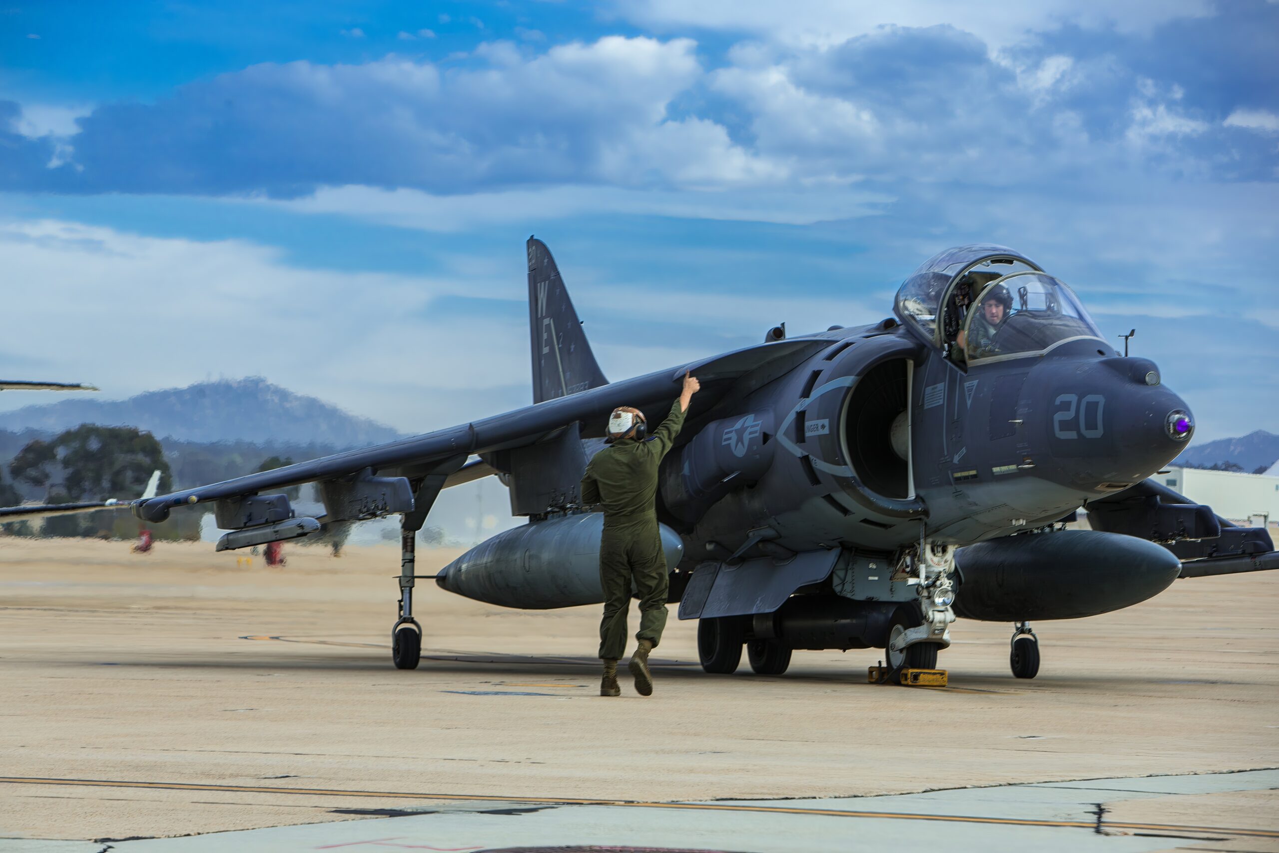 Marines with Marine Attack Squadron (VMA) 214 remove ordnance from an AV-8B Harrier II at Marine Corps Air Station Miramar, Calif.