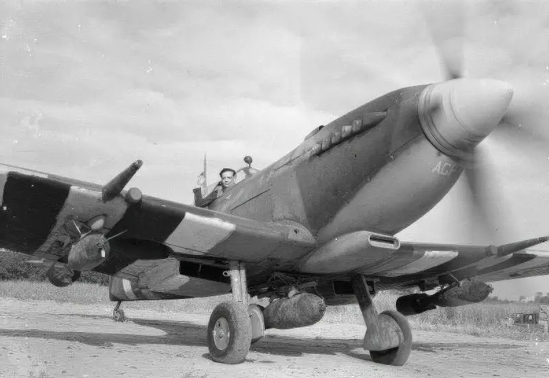 Spitfire with invasion stripes