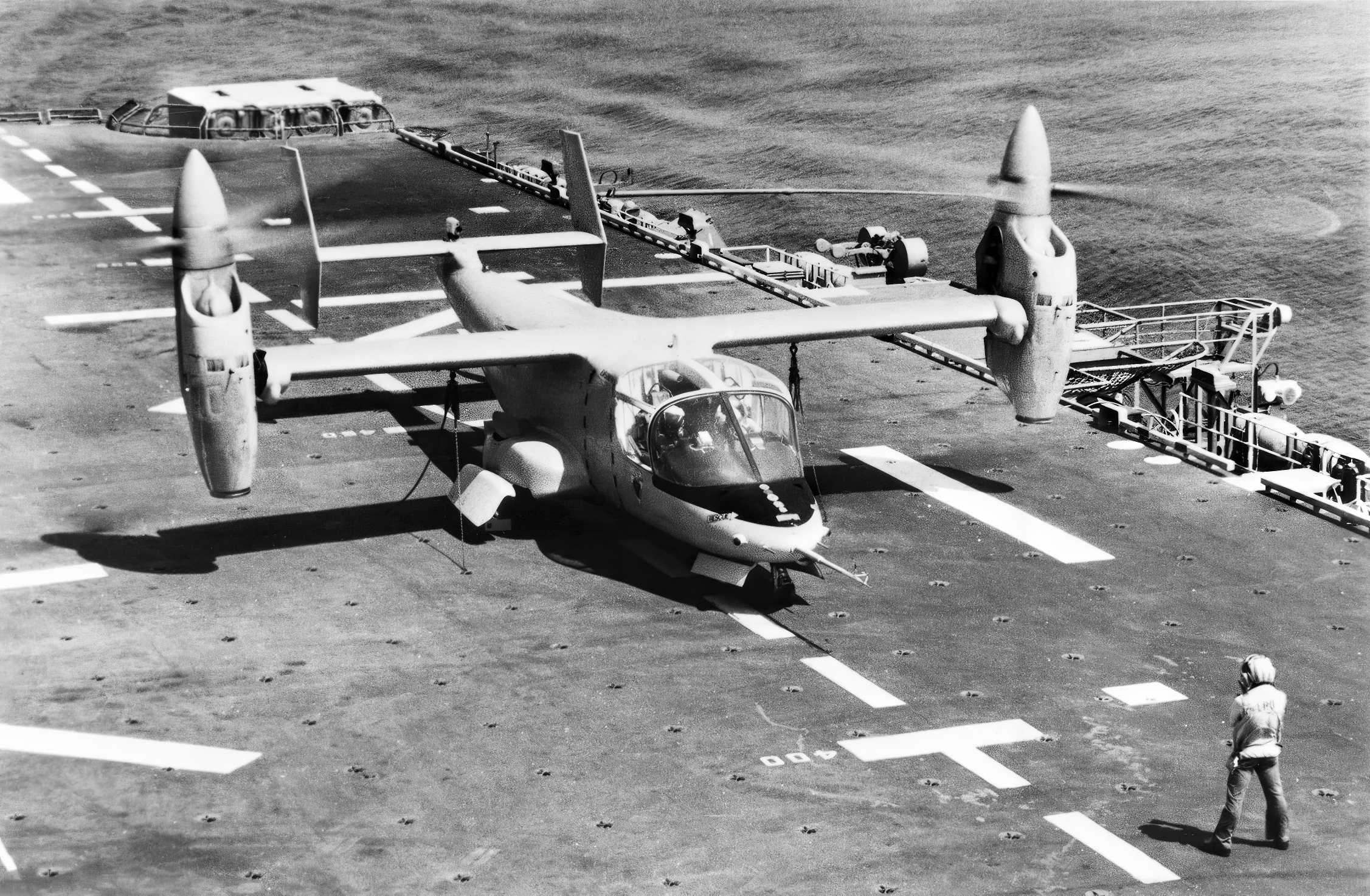 A Bell XV-15 prepares for take-off during trials aboard the amphibious assault ship USS Tripoli (LPH-10), on 1 August 1983