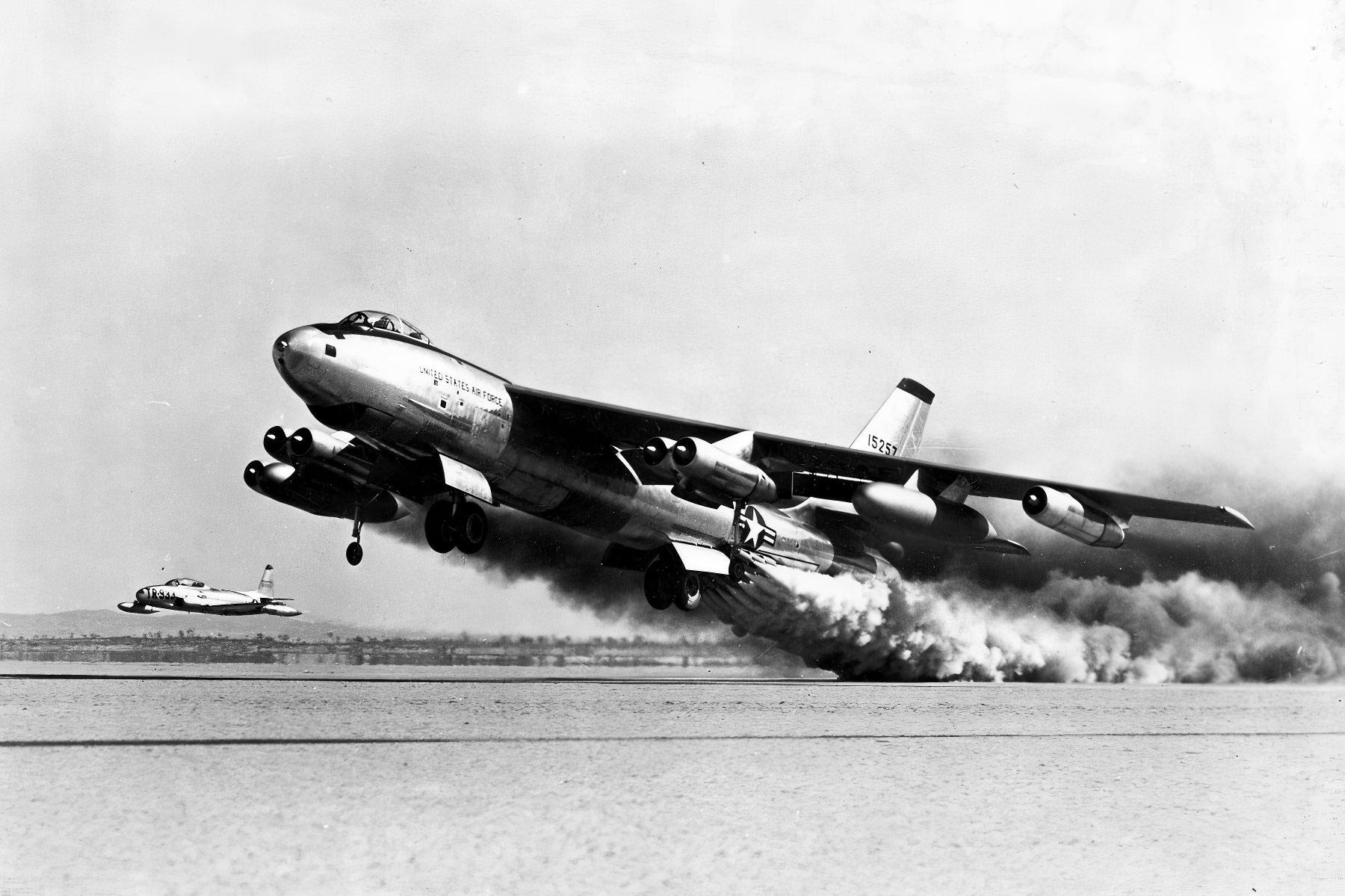 Boeing B-47E-65-BW (S/N 51-5257, the last Boeing-built block 65 -E model) during rocket-assisted take off test, with a Lockheed F-80 as a chase plane