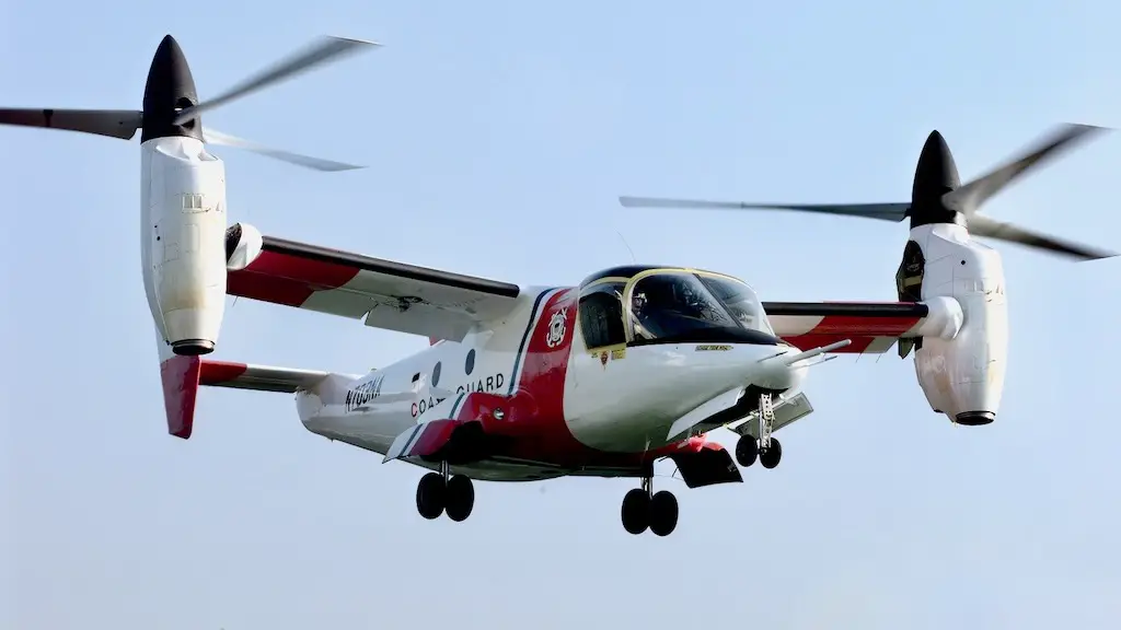 Washington, DC (Sept. 8) -- The Bell Textron XV-15 Tiltrotor aircraft prepares to land on the lawn of the Pentagon. The Tiltrotor, painted in Coast Guard colors, was part of the Pentagon Tiltrotor Technology Presentation sponsored by the U.S. Marine Corps in Washington, DC. Bell Textron is partnered with Lockhead-Martin as one of three teams hired to design surface, air and information technology systems for the 21st century Coast Guard. USCG photo by PA3 BRIDGET HIERONYMUS